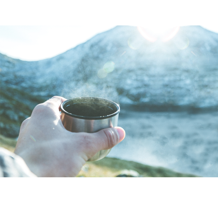 People painting mural with hand holding beverage - TenStickers