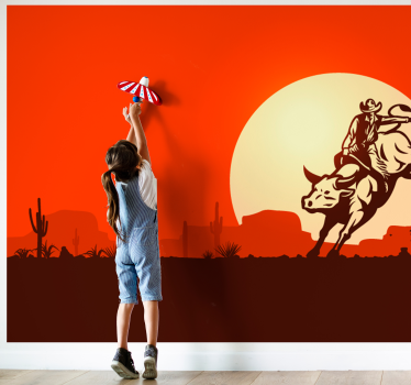 Cowboy riding a bull landscape wall mural - TenStickers