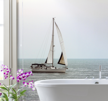 Sailing boat on the sea under the sea wall mural - TenStickers