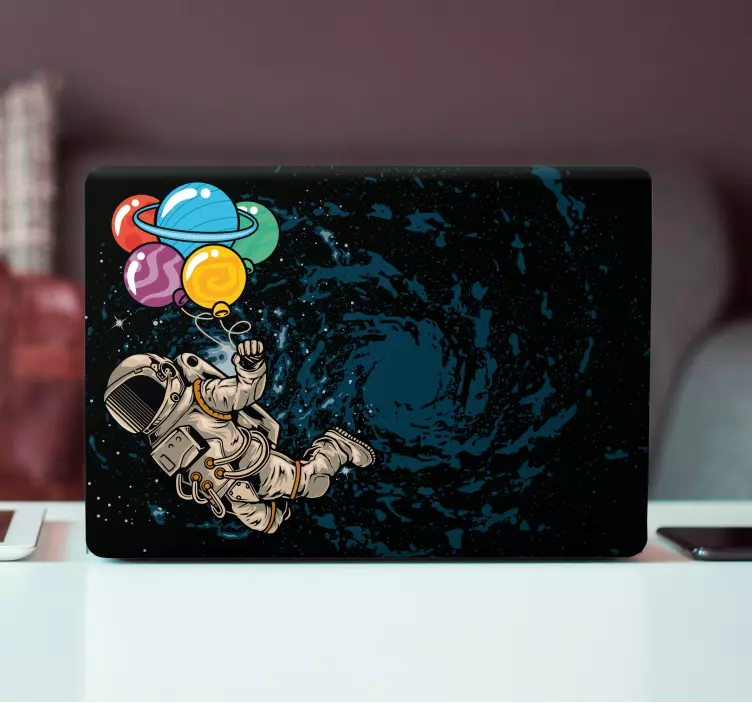 Laptop sticker cosmonaut with balloons - TenStickers