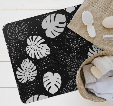 Black and white monstera leaves nature carpet - TenStickers