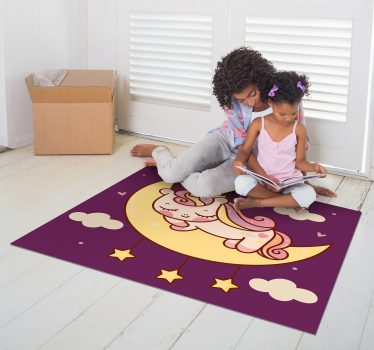 cute unicorn sleeping on a moon vinyl mat - TenStickers