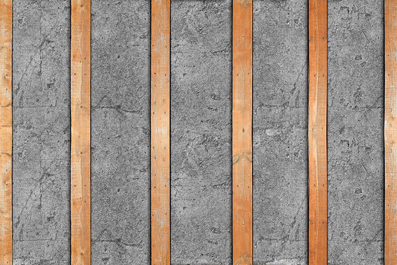 Textured vinyl rug with wooden plank design on concrete - TenStickers