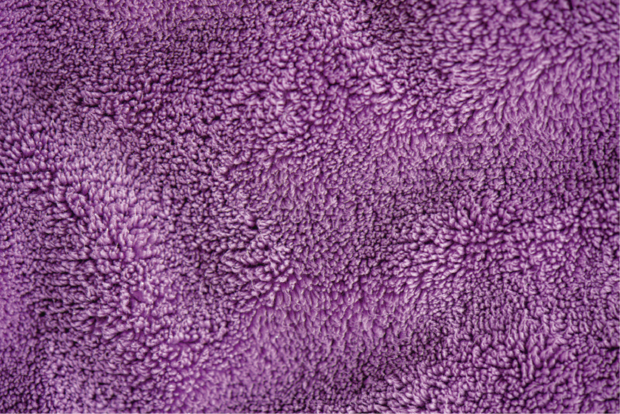 Textured vinyl rug in purple textured surface - TenStickers